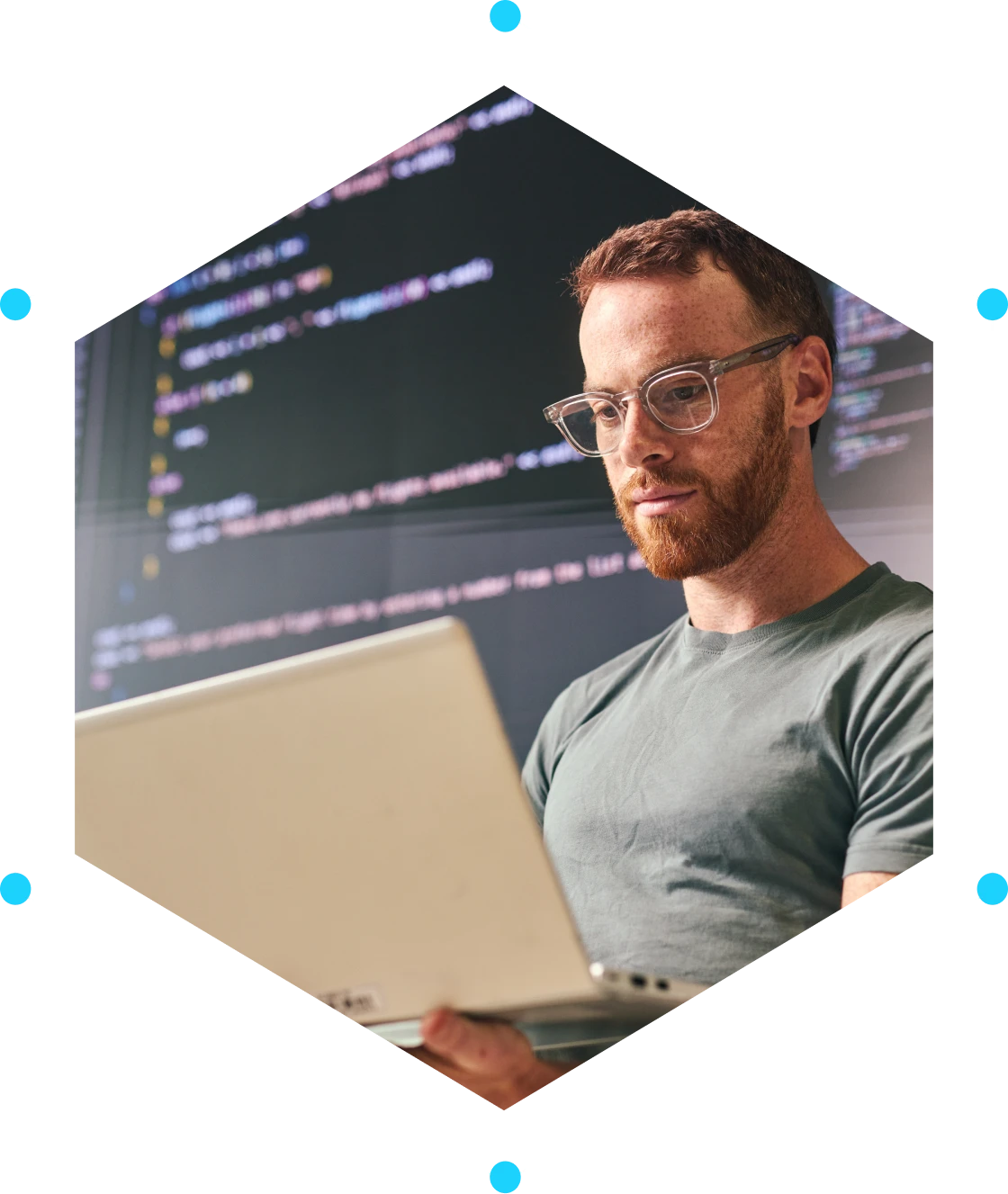 Programmer focused on computer screen